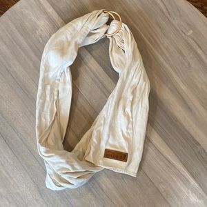 Cream wild bird Wildbird sling in sparrow with rose gold ring